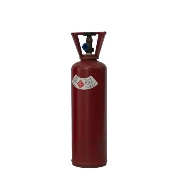 A red fire extinguisher stands idle against a black background, equipped with a gauge and safety pin, ready for emergency use.