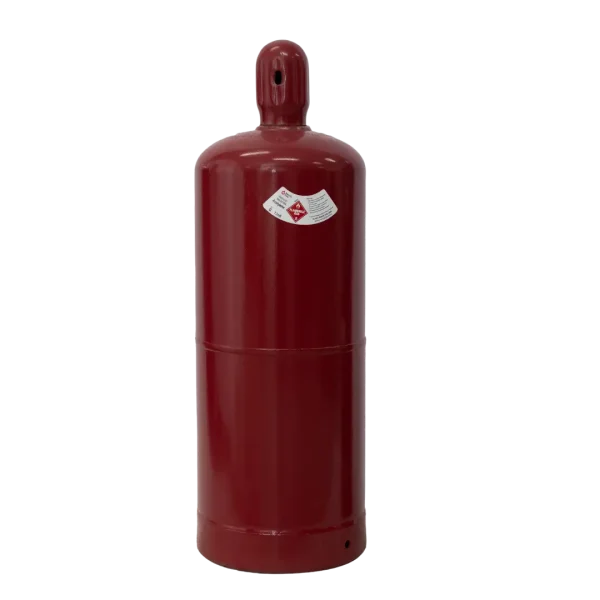 A red cylindrical gas bottle with a nozzle on top and a hazard label, standing against a black background.