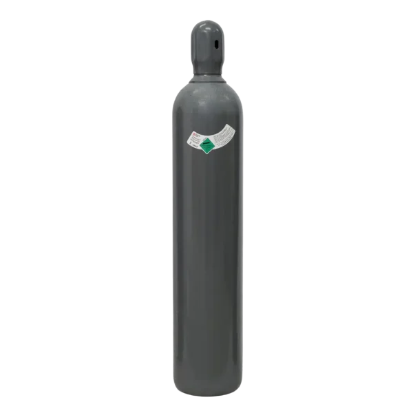 A tall, grey gas cylinder stands against a black background. It's upright and has a label with green and red colors.