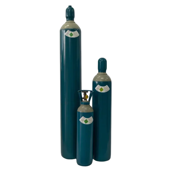 Three teal gas cylinders of varying sizes are standing vertically; one has a valve attached. The background is a plain dark hue. There is no text visible.